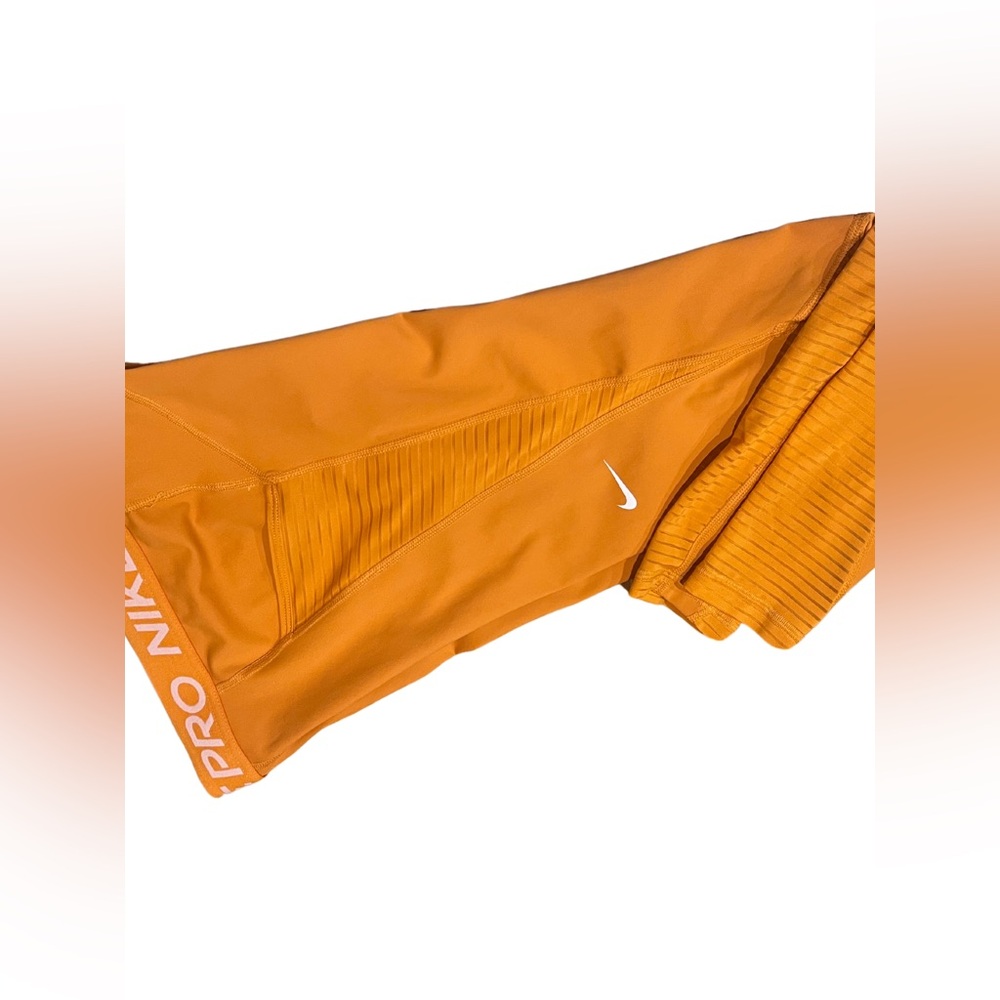 Nike pro dri-fit size small- yellow-orange